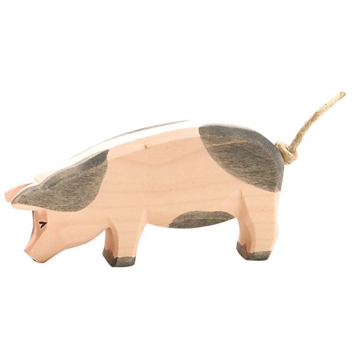 Cerdo de madera cabeza abajo