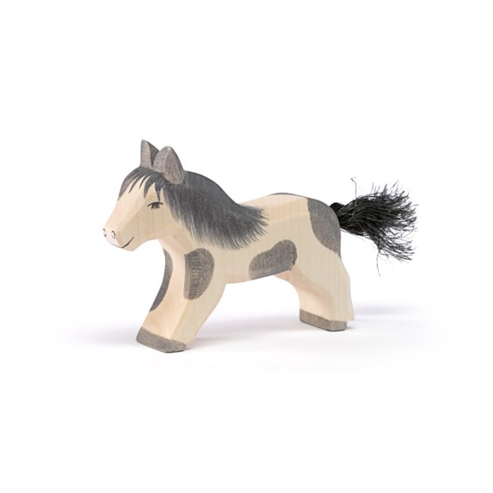 Pony de madera andando