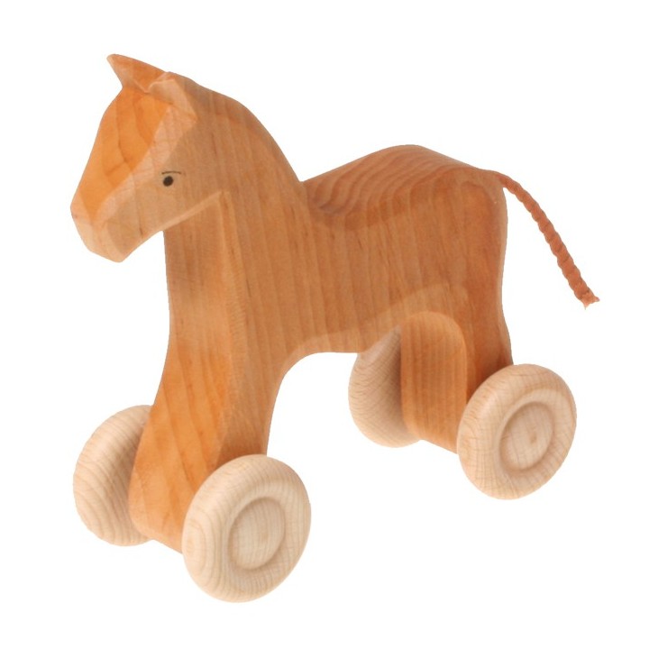 Caballo de madera con ruedas