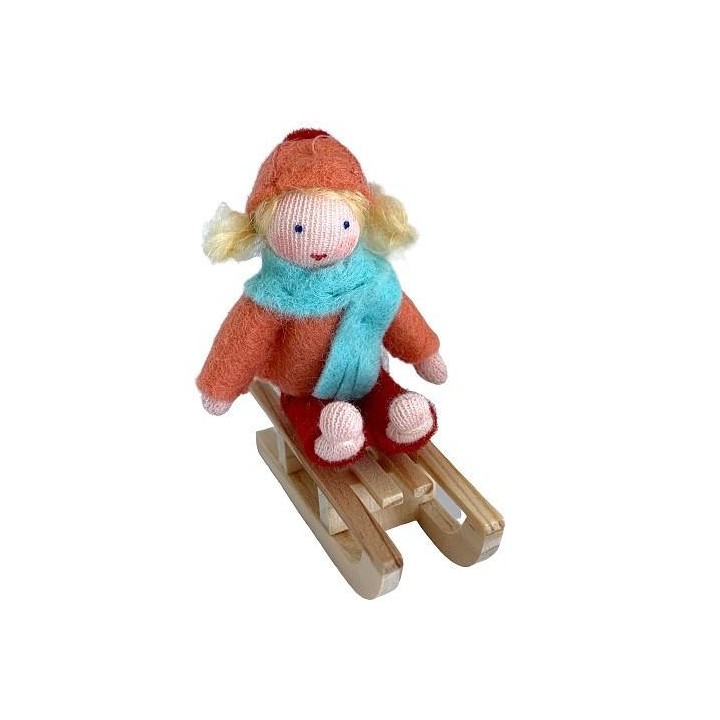 Niña con el tineo