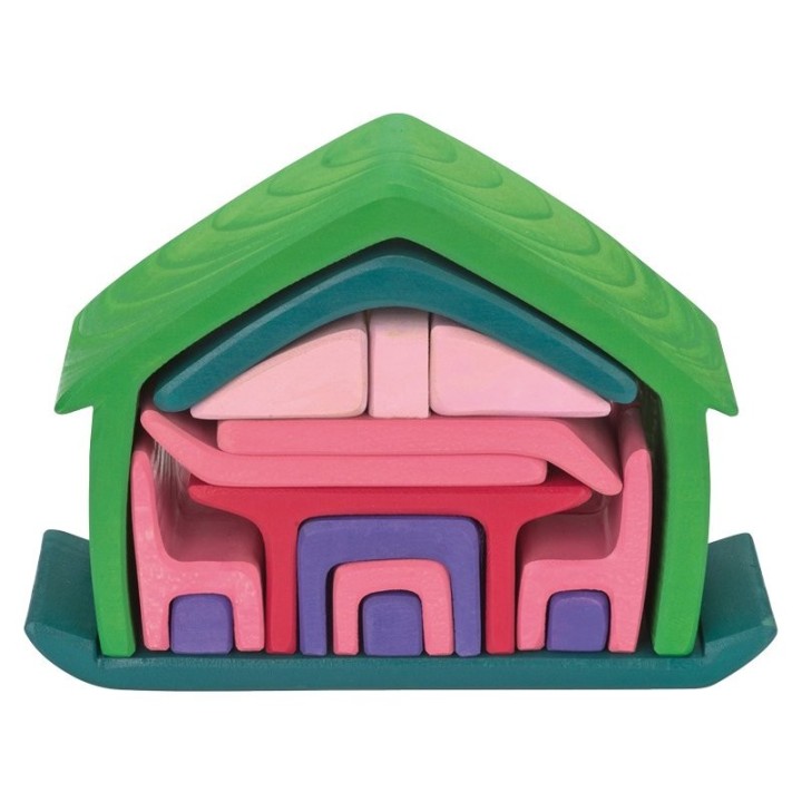 Casita rosa con muebles.