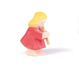 Niña tocando flauta.